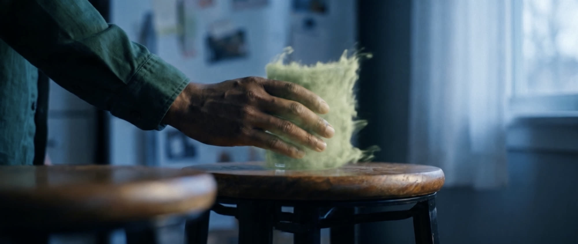 Quest — moss growing under a hand resting on a stool